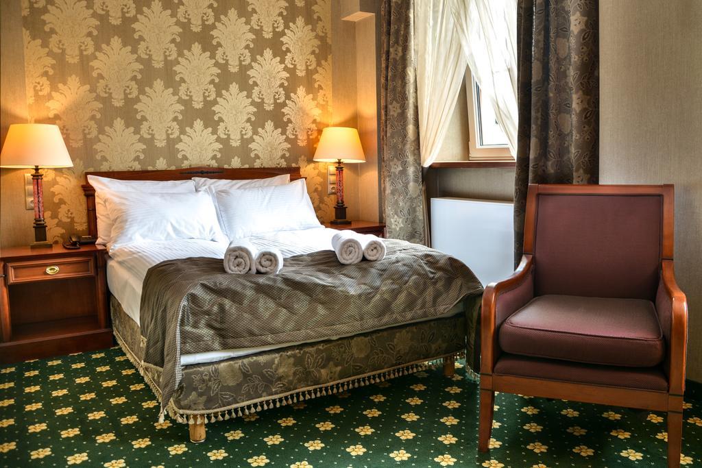 Komoda Club Residence Kalisz Chambre photo